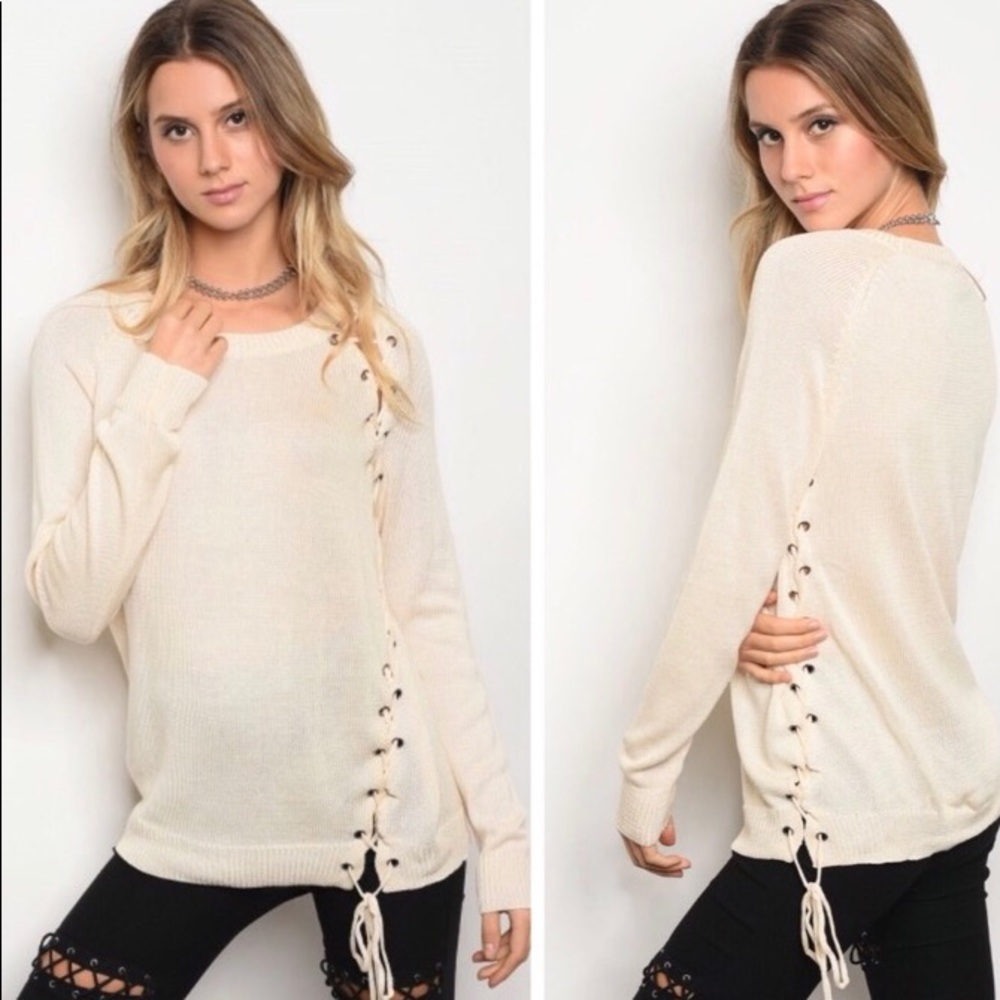 2 LEFT Iory lace up front sweater.